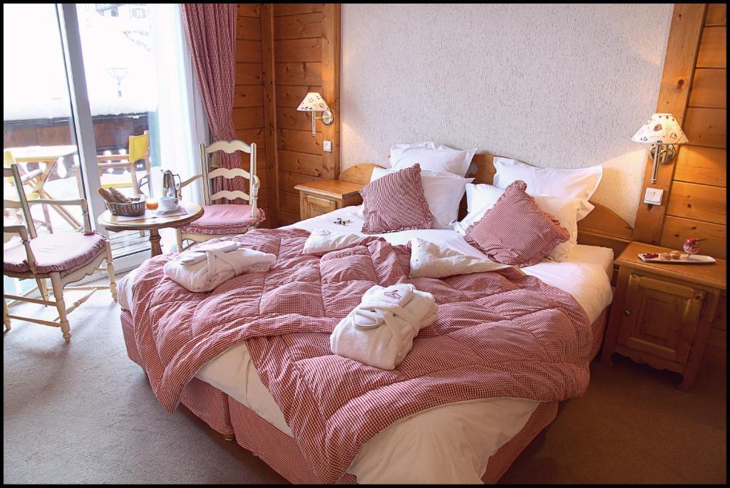 Chalet-Hotel La Marmotte, La Tapiaz & Spa, The Originals Relais レ・ジェ 部屋 写真